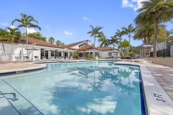 Resort-style swimming pool with sundeck